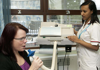 Patient undertaking Spirometry